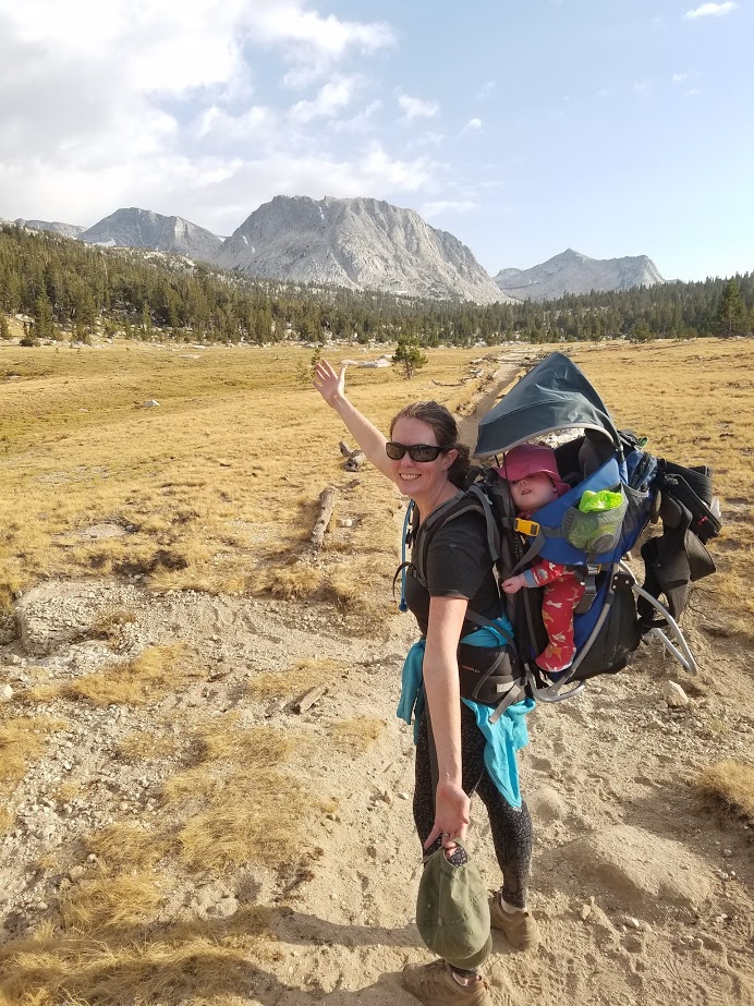 Emily with Lydia in backpack